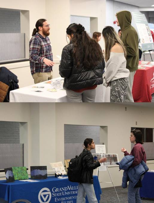 students viewing the table of a community partner, viewing art display table
